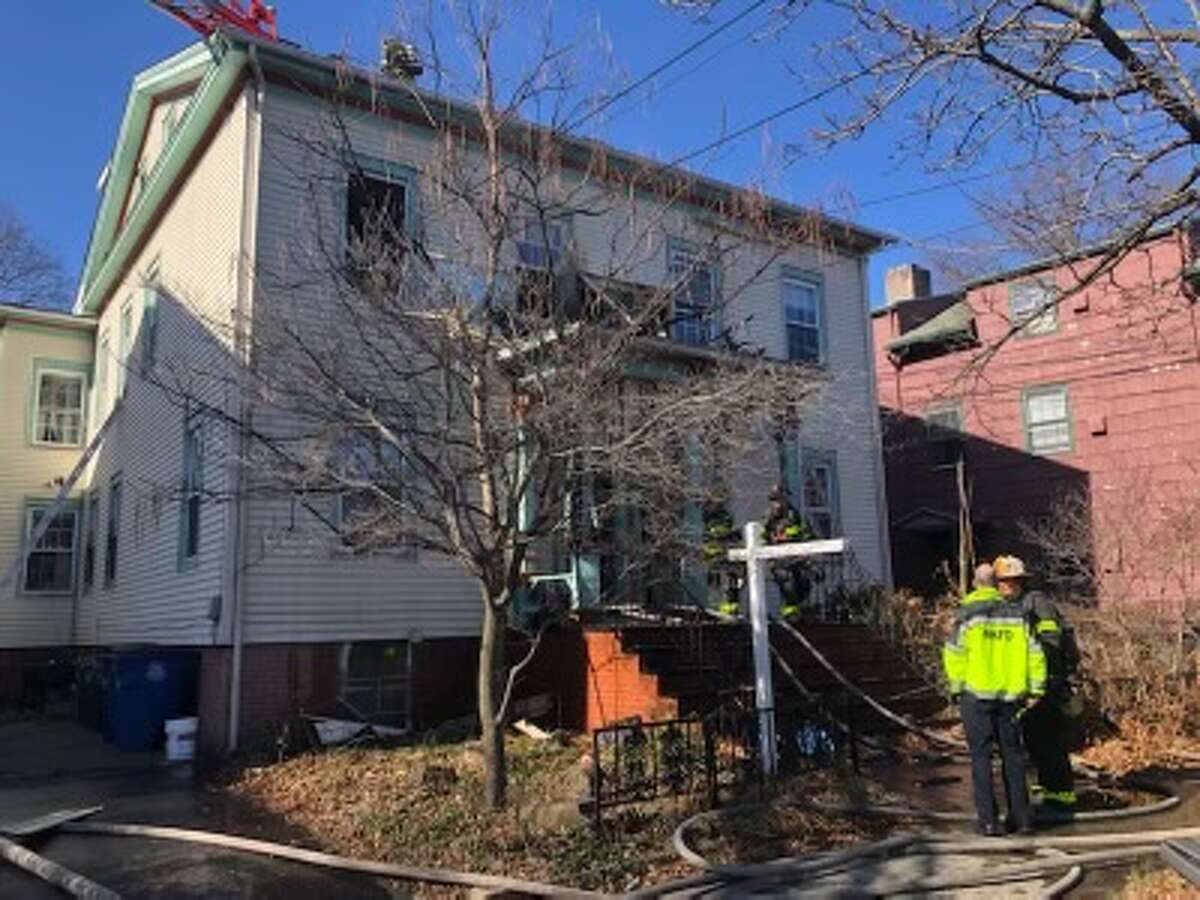 A porch fire displaced all six units of this multi-family home at 194 Dwight St. in New Haven on Saturday afternoon, a fire official said.