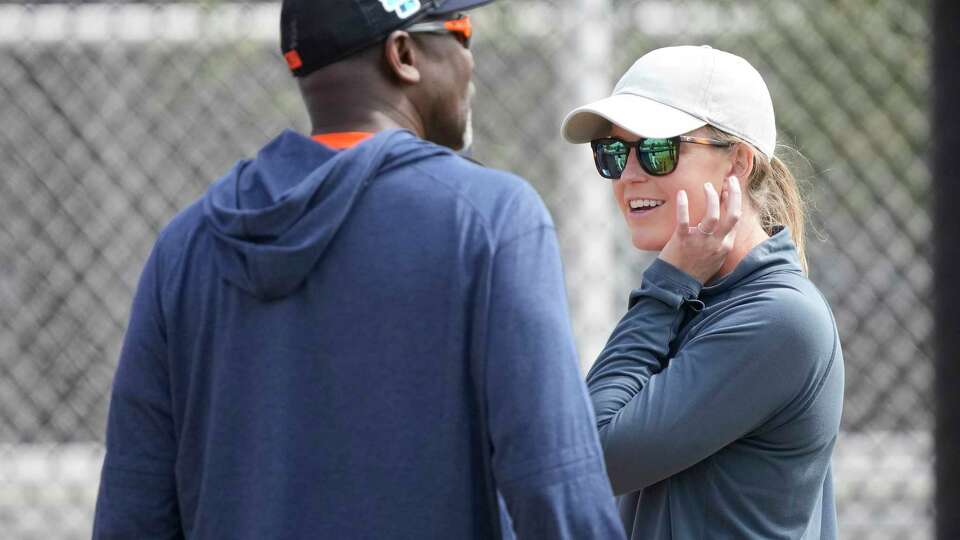 Sara Goodrum, Houston Astros director of player development talks with Astros third base coach Gary Pettis during workouts at the Astros spring training complex at The Ballpark of the Palm Beaches on Saturday, Feb. 18, 2023 in West Palm Beach .