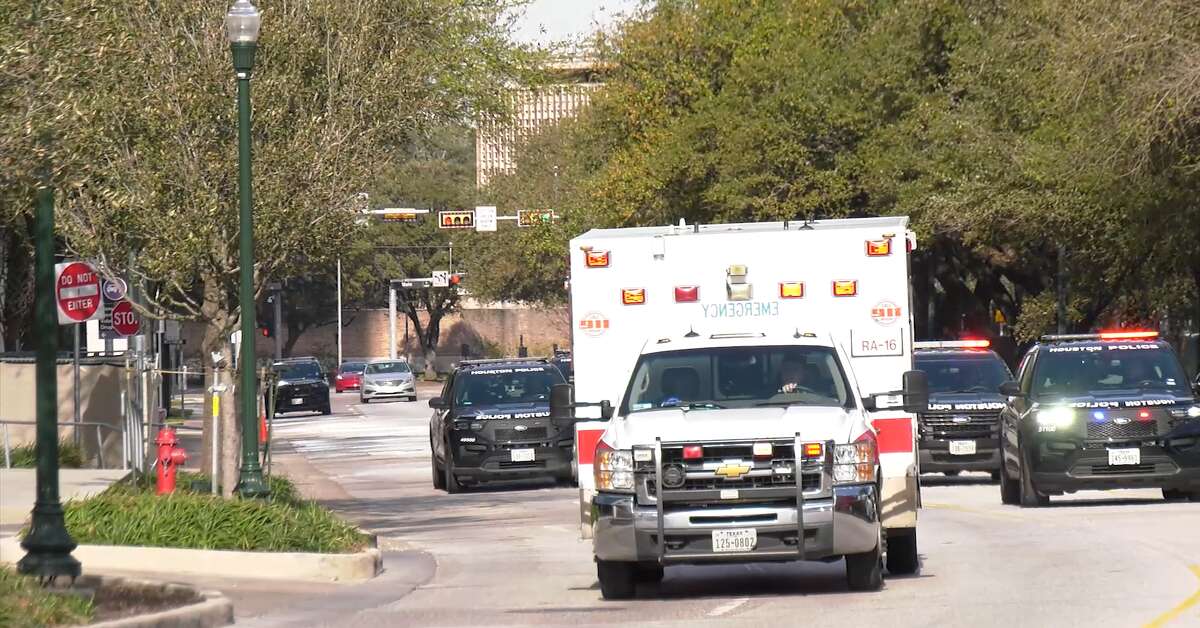 The ambulances ferrying two officers stabbed on Feb. 18, 2023, in the 13300 block of Agarita Lane arrive at a hospital. 