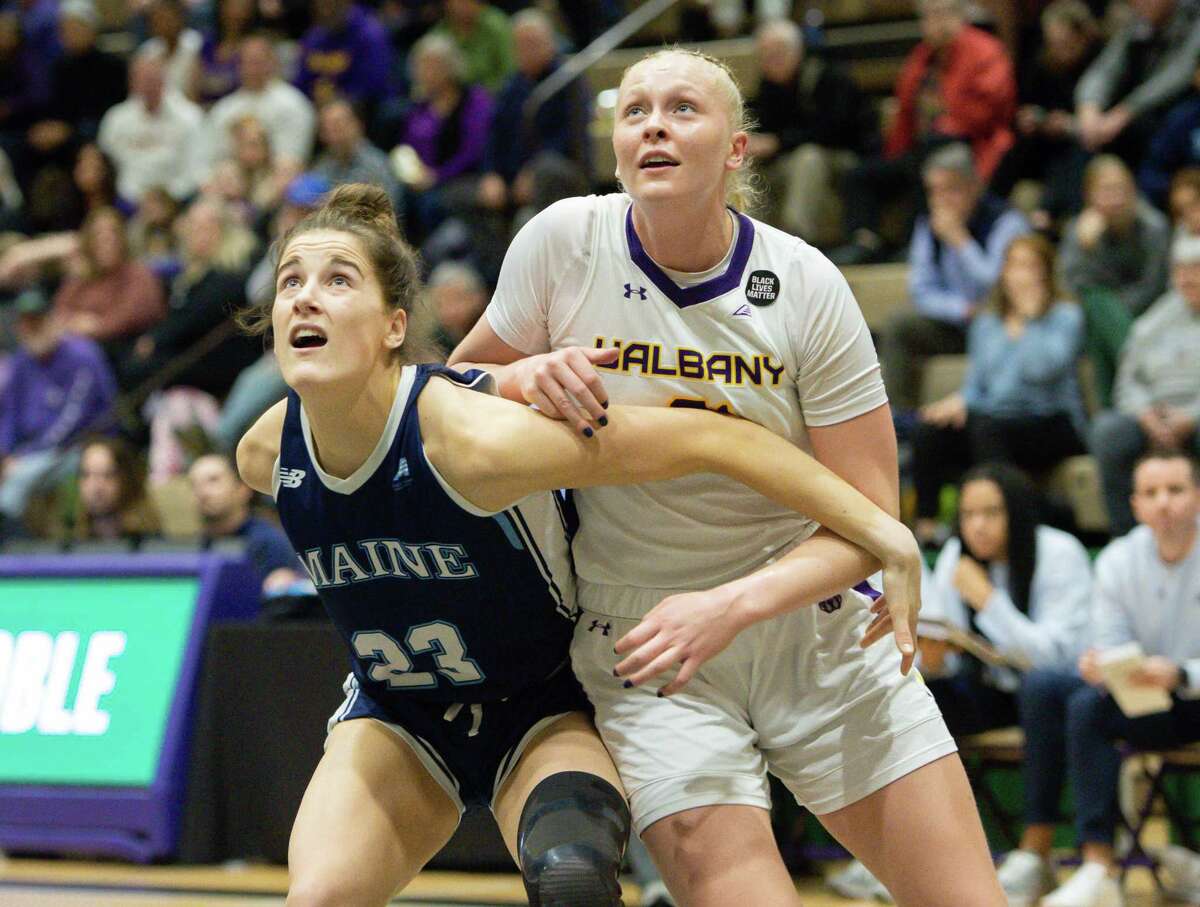 Maine’s Abbe Lawrence guards UAlbany’s Helene Haegerstrand as a UAlbany foul shot rebounds during a game at McDonough Sports Complex in Troy, N.Y. on Sunday, Feb. 15, 2023. (Jenn March, Special to the Times Union)