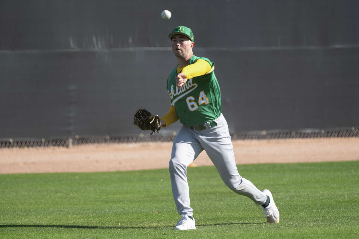 Ken Waldichuk throws during a pitchers and catchers practice at Hohokam Park in Mesa, Arizona, U.S., February 15, 2023.