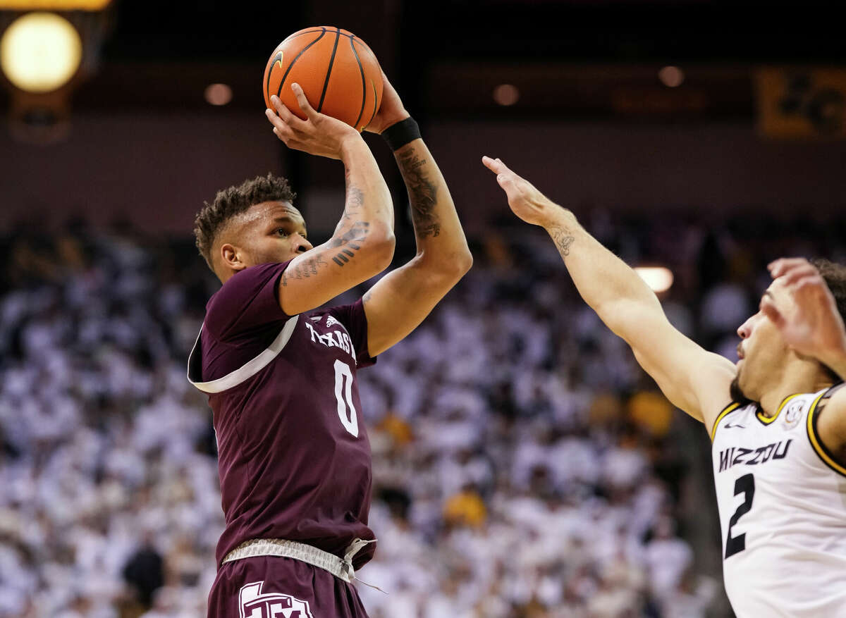 Dexter Dennis, here shooting over Missouri's Tre Gomillion in Texas A&M's road victory Saturday, says their 6-5 nonconference start made the Aggies treat every subsequent game like a high-stakes encounter. 