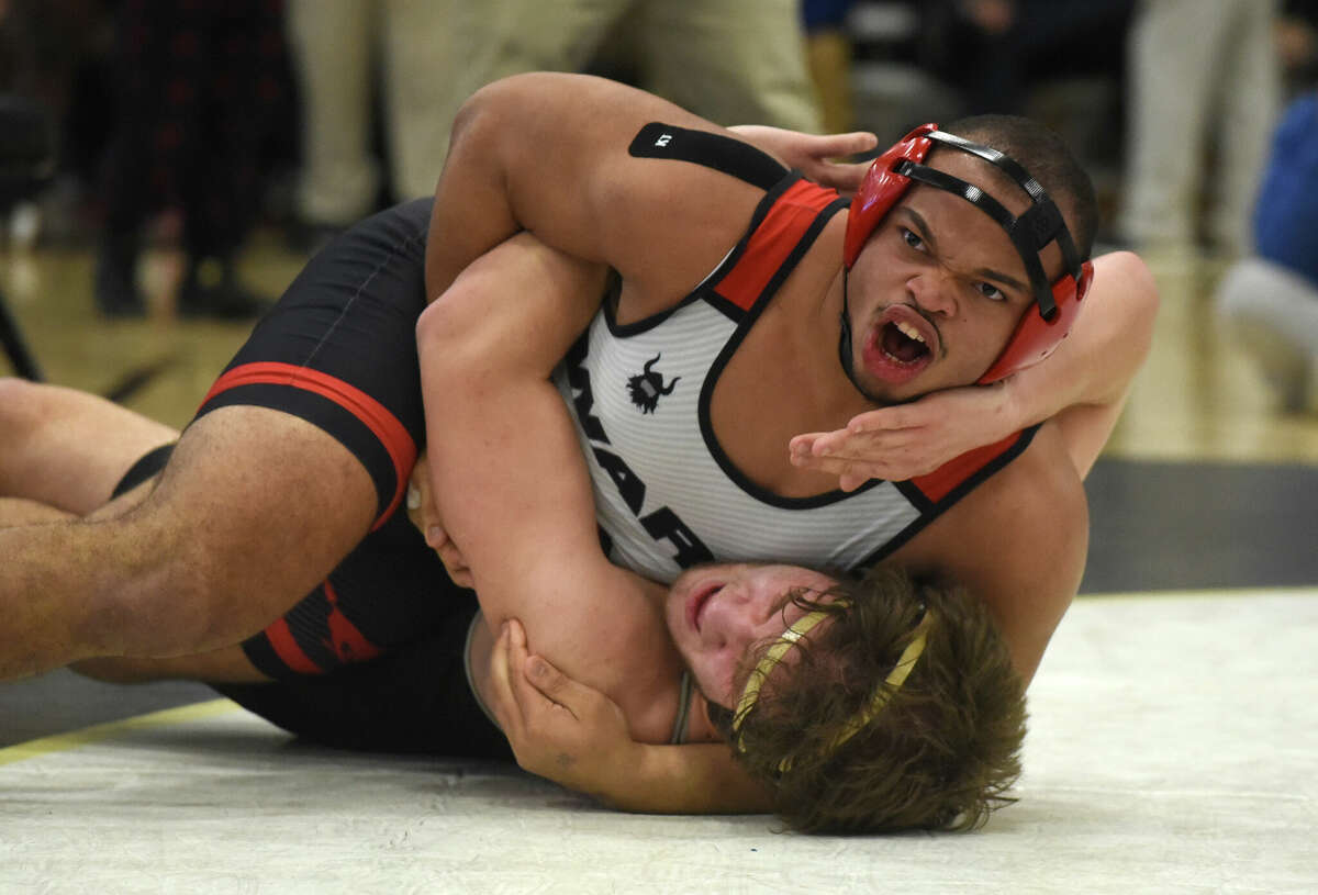 Trumbull, New Milford, Xavier claim wrestling tournament titles