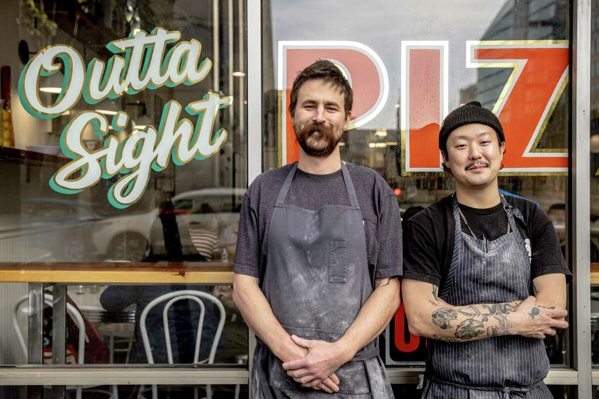 Peter Dorrance (left) and Eric Ehler are co-owners of Outta Sight Pizza, whose opening in San Francisco’s Tenderloin neighborhood defied a slowdown last year.