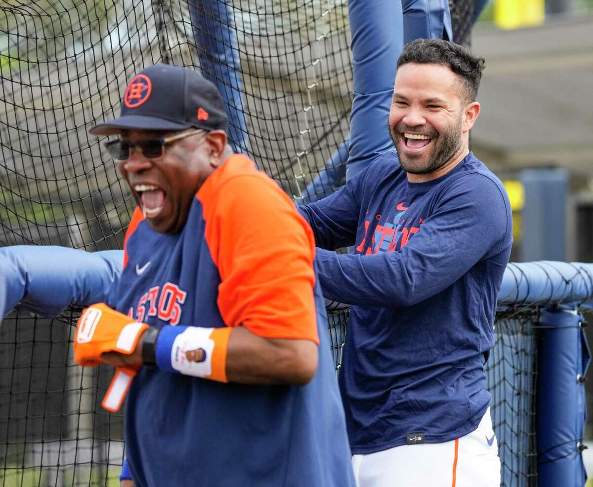 Houston Astros manager Dusty Baker Jr. laughs with second baseman Jose Altuve during workouts at the Astros spring training complex at The Ballpark of the Palm Beaches on Sunday, Feb. 19, 2023 in West Palm Beach .