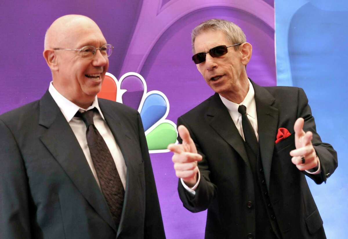 FILE - Actors Dann Florek, left, and Richard Belzer from "Law & Order: SVU" attend the NBC Network 2013 Upfront at Radio City Music Hall, Monday, May 13, 2013, in New York. Belzer, the longtime stand-up comedian who became one of TV's most indelible detectives as John Munch in “Homicide: Life on the Street” and “Law & Order: SVU,” has died at age 78. Belzer died Sunday, Feb. 19, 2023, at his home in Bozouls in southern France, his longtime friend Bill Scheft told The Hollywood Reporter. (Photo by Evan Agostini/Invision/AP, File)