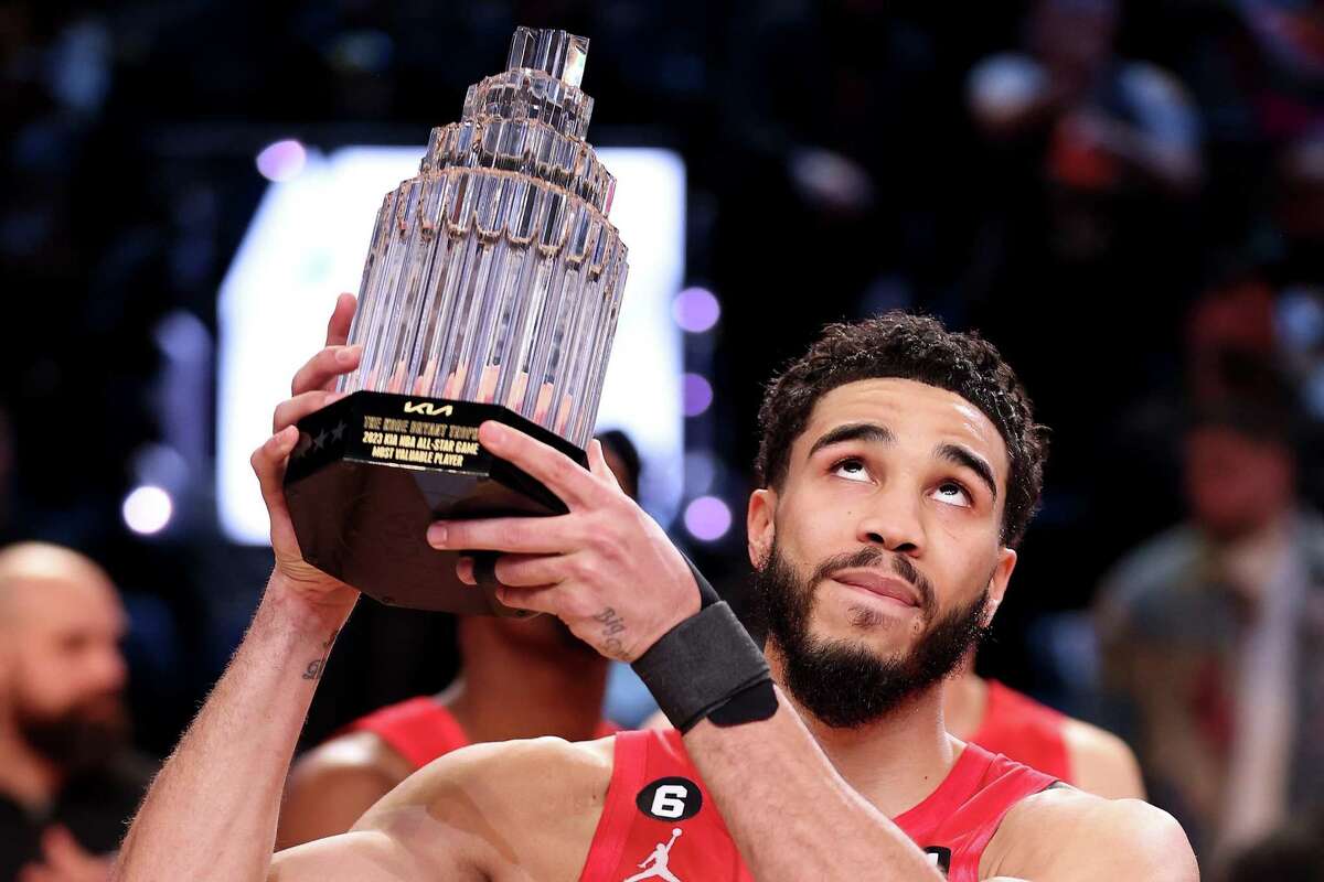 SALT LAKE CITY, UTAH - FEBRUARY 19: Jayson Tatum #0 of the Boston Celtics hoists The Kobe Bryant MVP Trophy after the 2023 NBA All Star Game between Team Giannis and Team LeBron at Vivint Arena on February 19, 2023 in Salt Lake City, Utah. NOTE TO USER: User expressly acknowledges and agrees that, by downloading and or using this photograph, User is consenting to the terms and conditions of the Getty Images License Agreement. (Photo by Tim Nwachukwu/Getty Images)