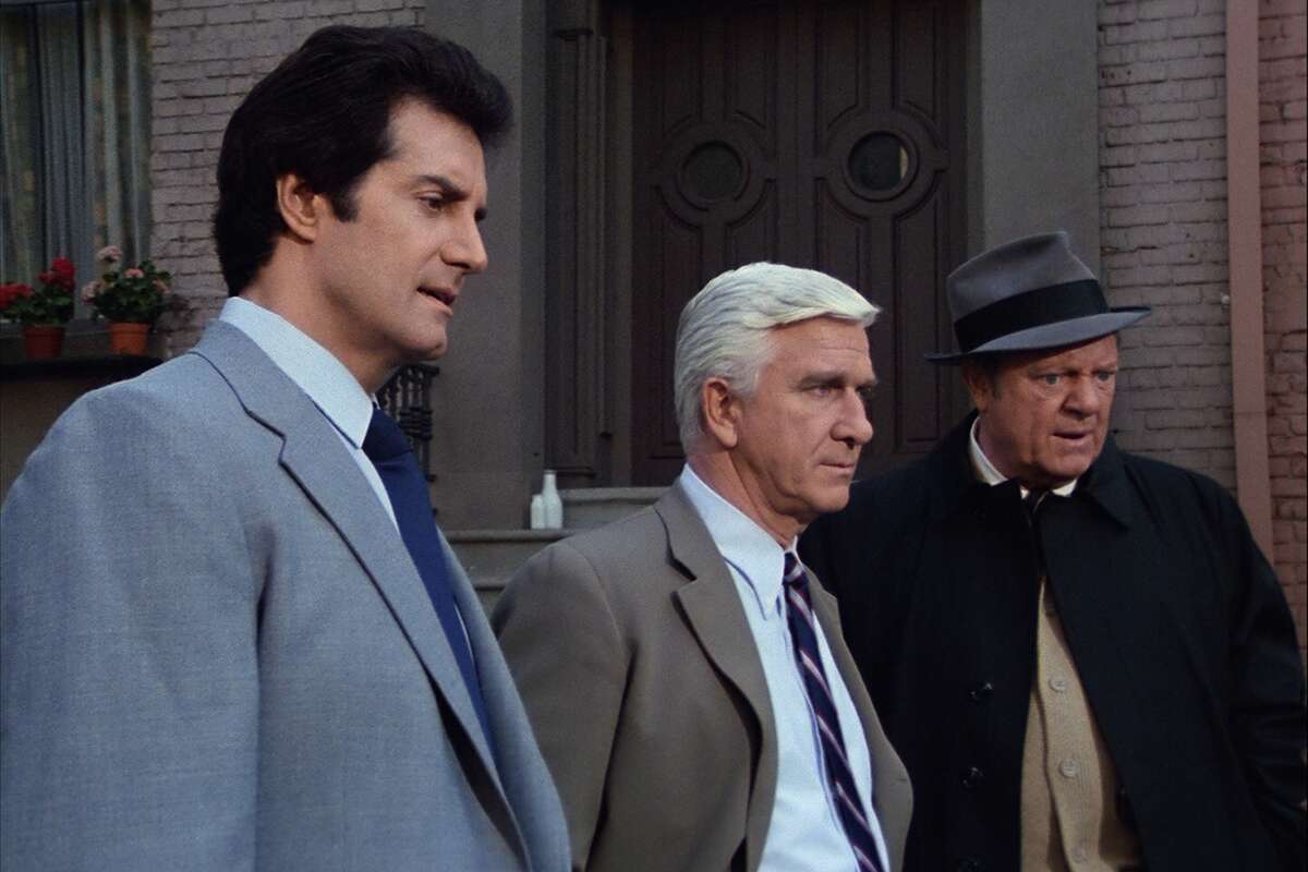 The six-episode 1982 TV comedy "Police Squad!" had more success once it transferred to the big screen and changed its name to "The Naked Gun"; the Leslie Nielsen-led film franchise spanned three features and earned a combined $477 million. Unfortunately for Peter Lupus, left, and Alan North, right, they didn't make the move. 