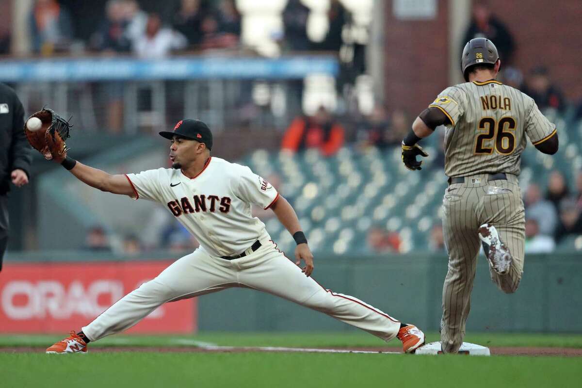 LaMonte Wade Jr. #31 of the San Francisco Giants is congratulated