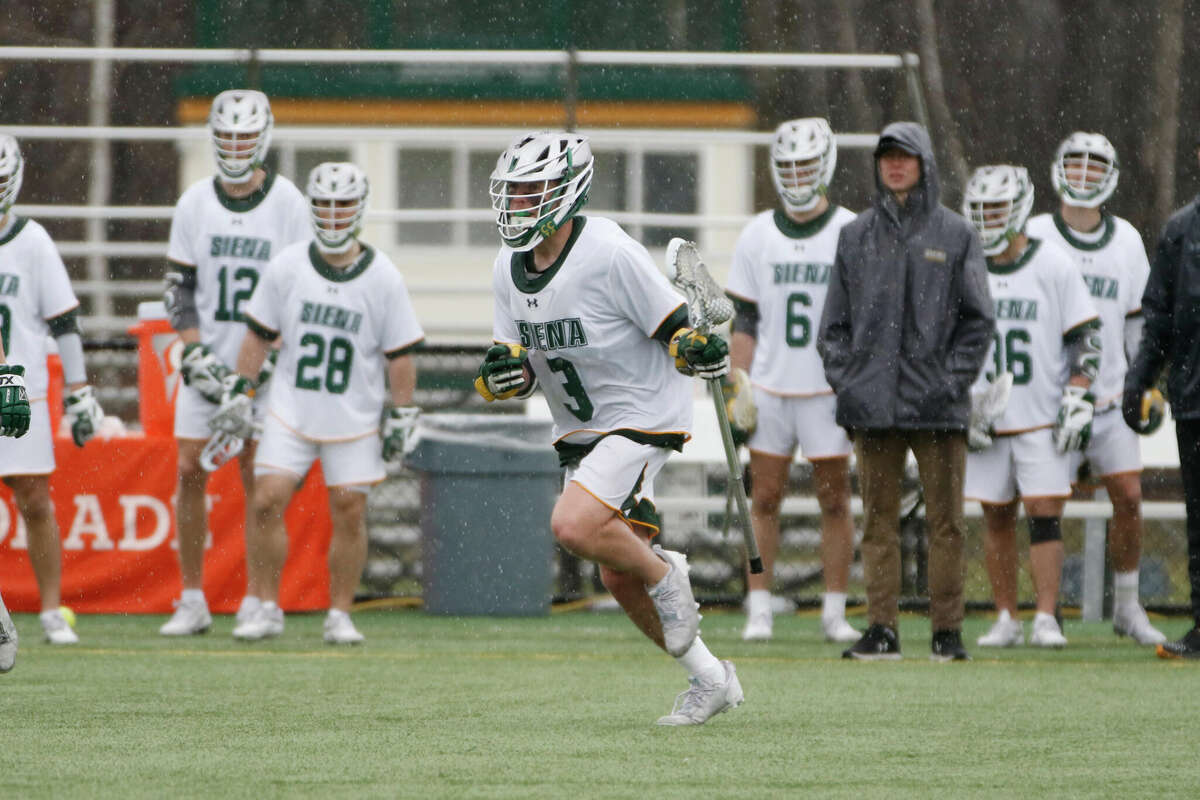 Siena senior faceoff specialist Dylan Pape, seen last season, won 11 of 18 draws against UMass Lowell on Sunday as the Saints won at home, 16-12.