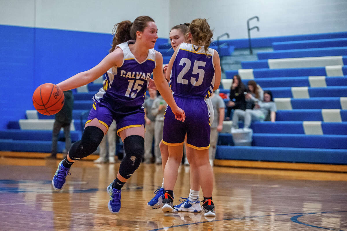 Calvary Baptist's Caitlyn Dickerson makes a move off the dribble during a Feb. 20, 2023 game against Coleman. Dickerson had 34 points, eight rebounds, and seven steals in Wednesday's district semifinal win over Fulton.