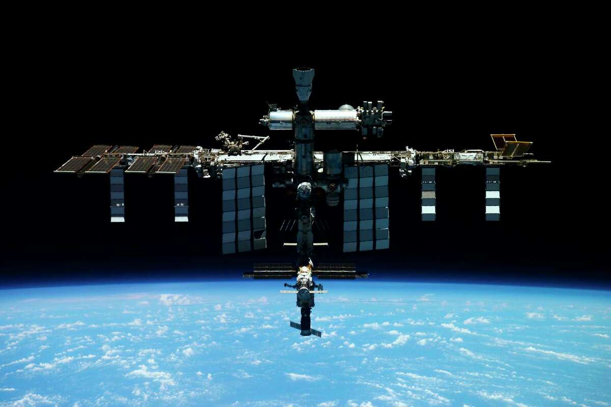 FILE This undated handout photo released by Roscosmos State Space Corporation shows the International Space Station (ISS). The Russian space corporation Roscosmos said Tuesday, Feb. 21, 2023 that Russia will extend its participation in the International Space Station until 2028. (Roscosmos State Space Corporation via AP, File)