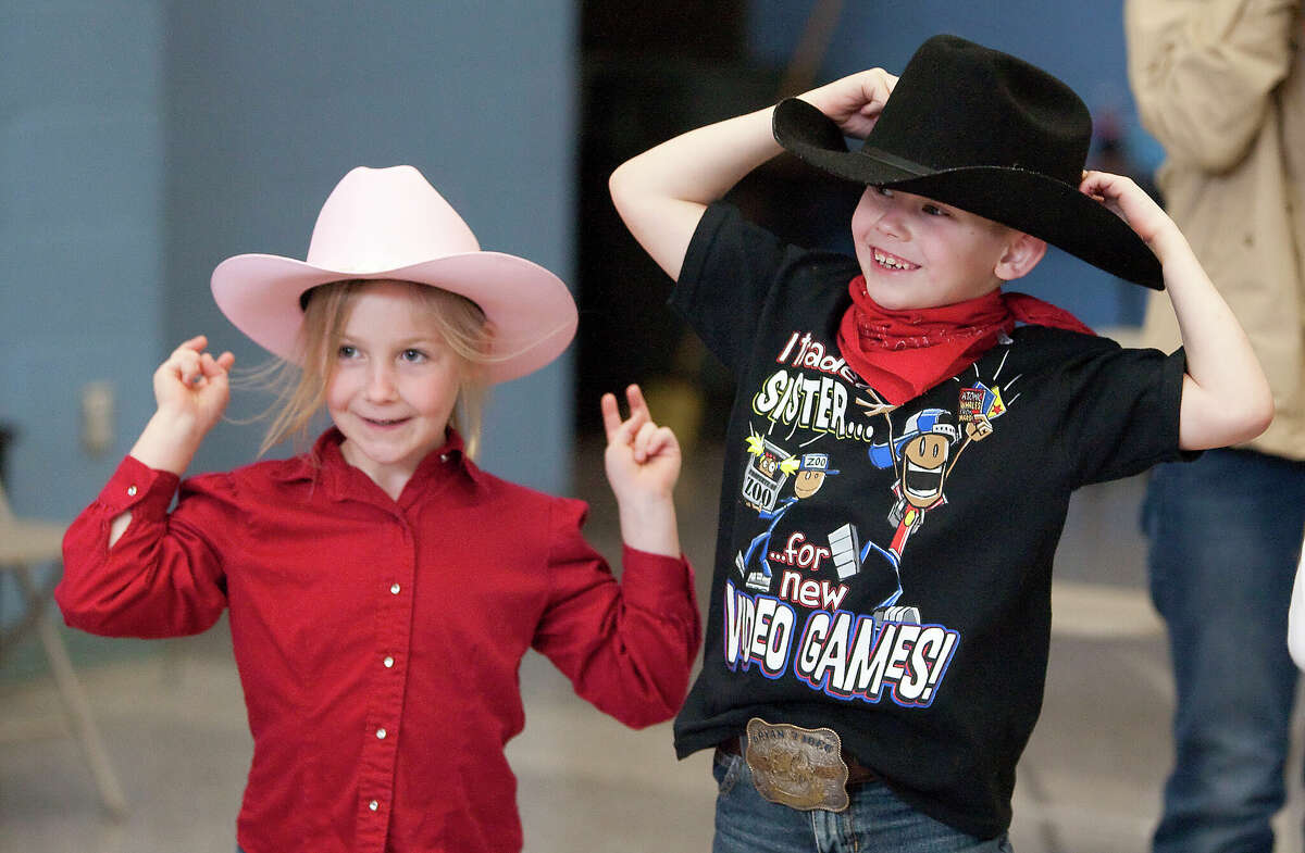 2023 Houston Rodeo Go Texan Day Houstonians dress up as cowboys