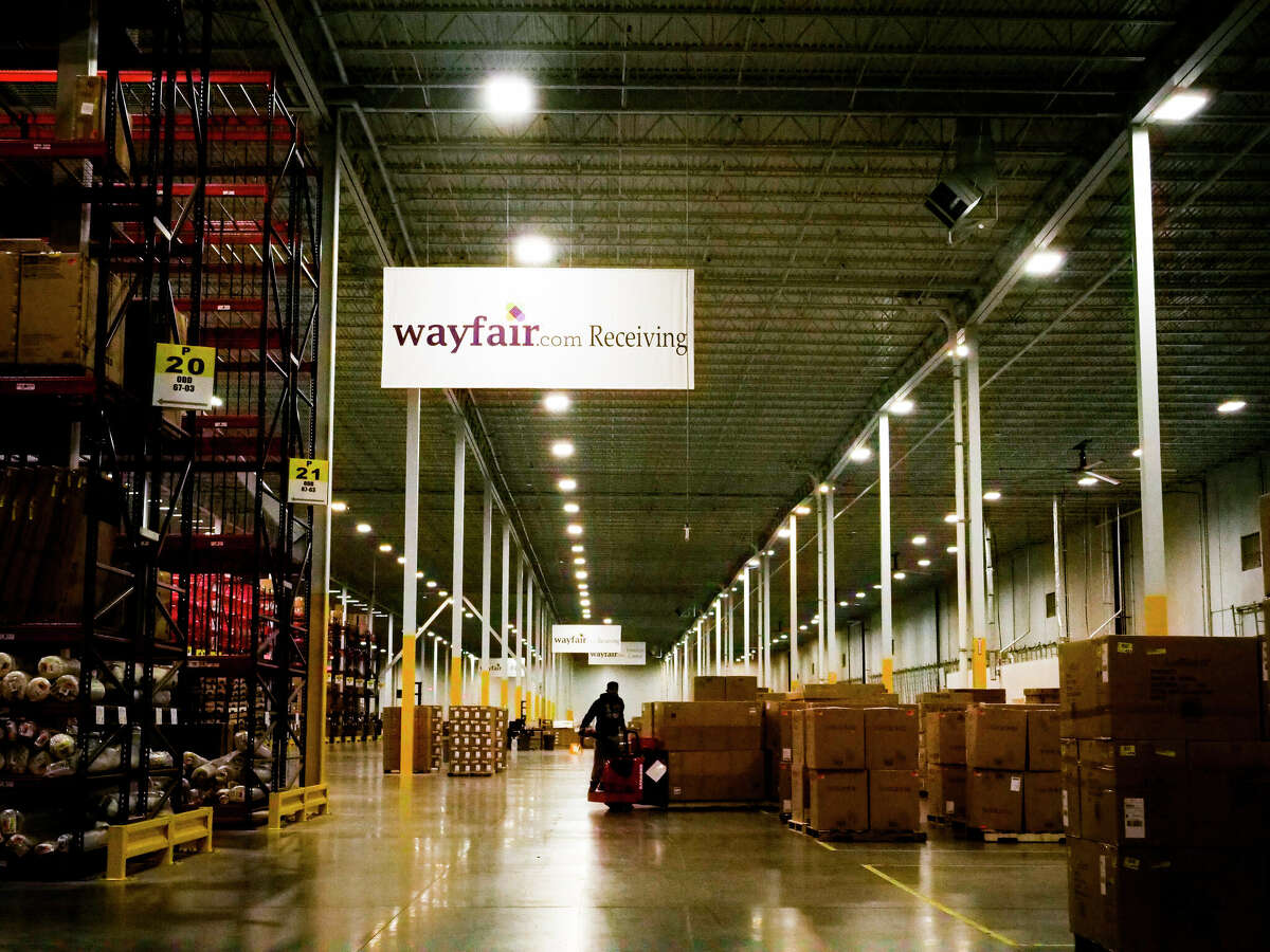Boston-based online furniture retailer Wayfair has scrapped plans to occupy 1.2 million square-foot fulfillment center in North Houston. Pictured is a file photo of a worker inside the Wayfair distribution center in Cranbury, N.J. on April 13, 2017. (John Taggart\ The New York Times)