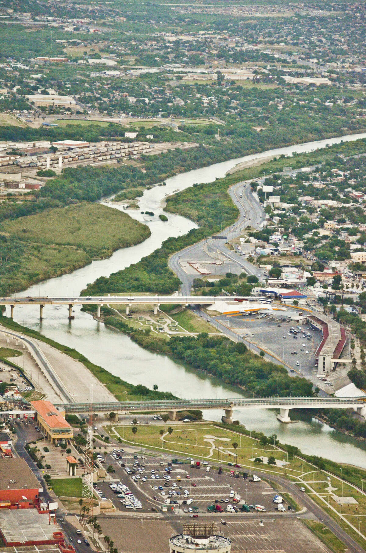 An aerial view of the Juarez-Lincoln International Bridge, Gateway to the Americas International Bridge, the Rio Grande and Mexico, right, as seen on April, 10, 2014.