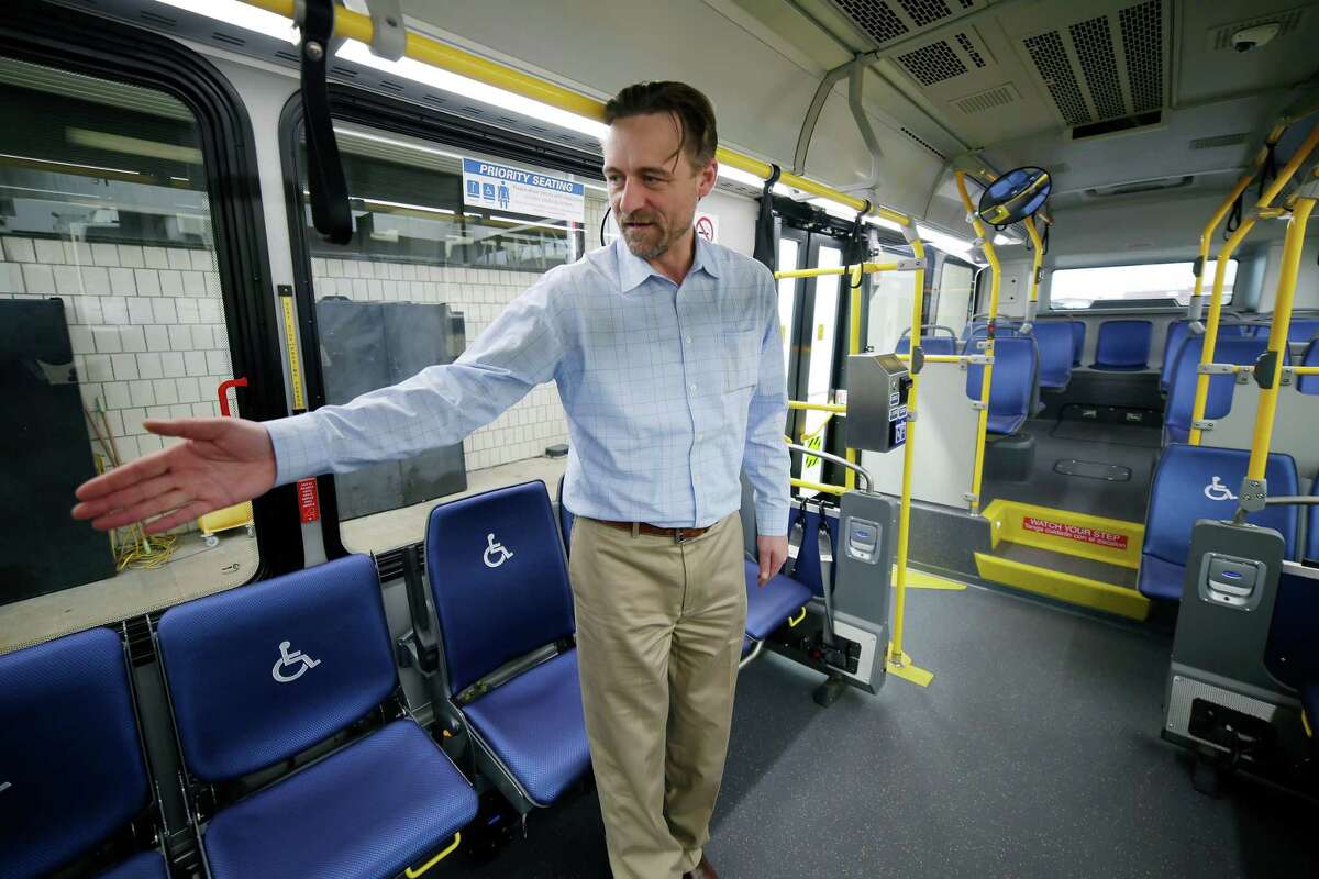 Andrei Dragomir, with Metropolitan Transit Authority, leads a tour of the first of 20 large electric buses Metropolitan Transit Authority will add to its fleet, parked at the Kashmere Bus operating Facility on Tuesday, Feb. 21, 2023 in Houston.