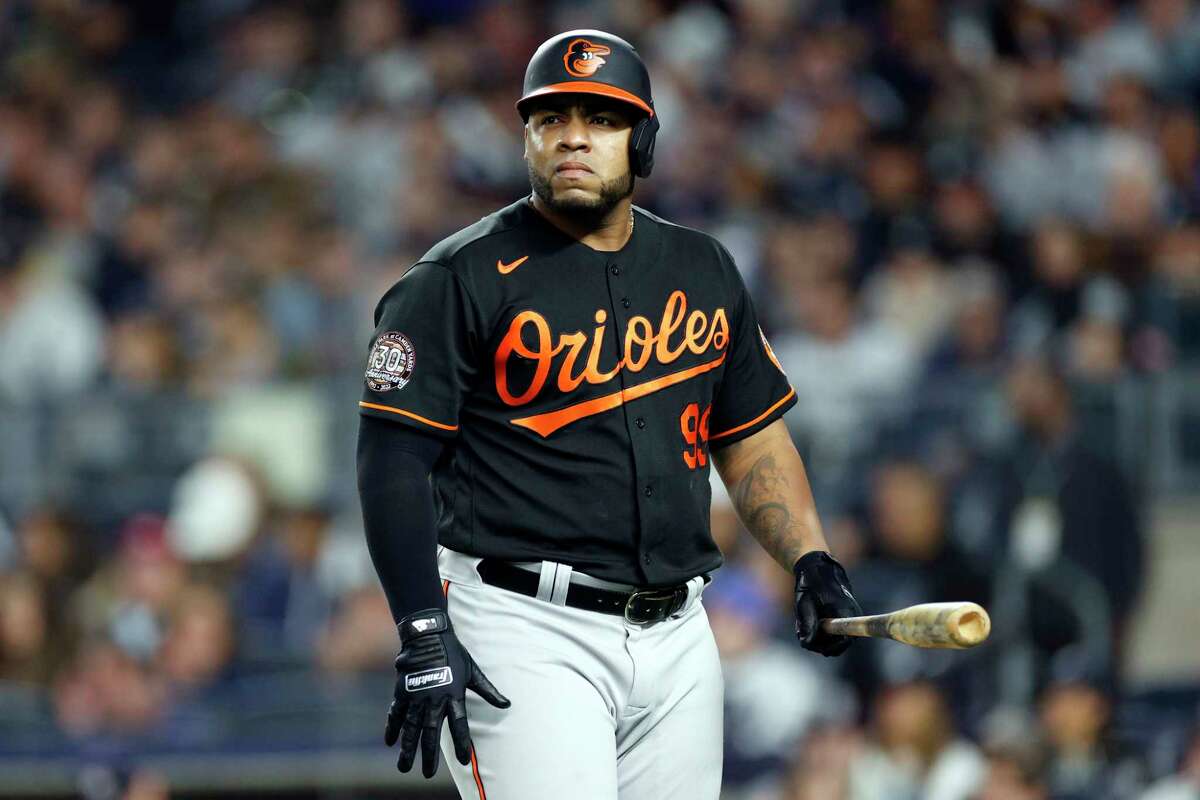 NEW YORK, NEW YORK - SEPTEMBER 30: Jesus Aguilar #99 of the Baltimore Orioles reacts at bat during the sixth inning against the New York Yankees at Yankee Stadium on September 30, 2022 in the Bronx borough of New York City.