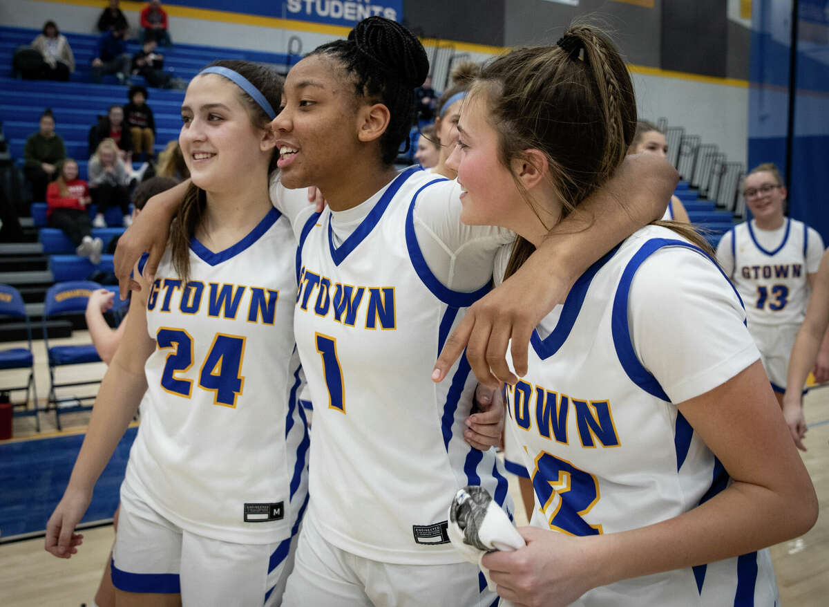 KK Arnold celebrates a win with teammates after their game at Germantown High School in Germantown, Wisconsin Tuesday, Feb. 14, 2023.