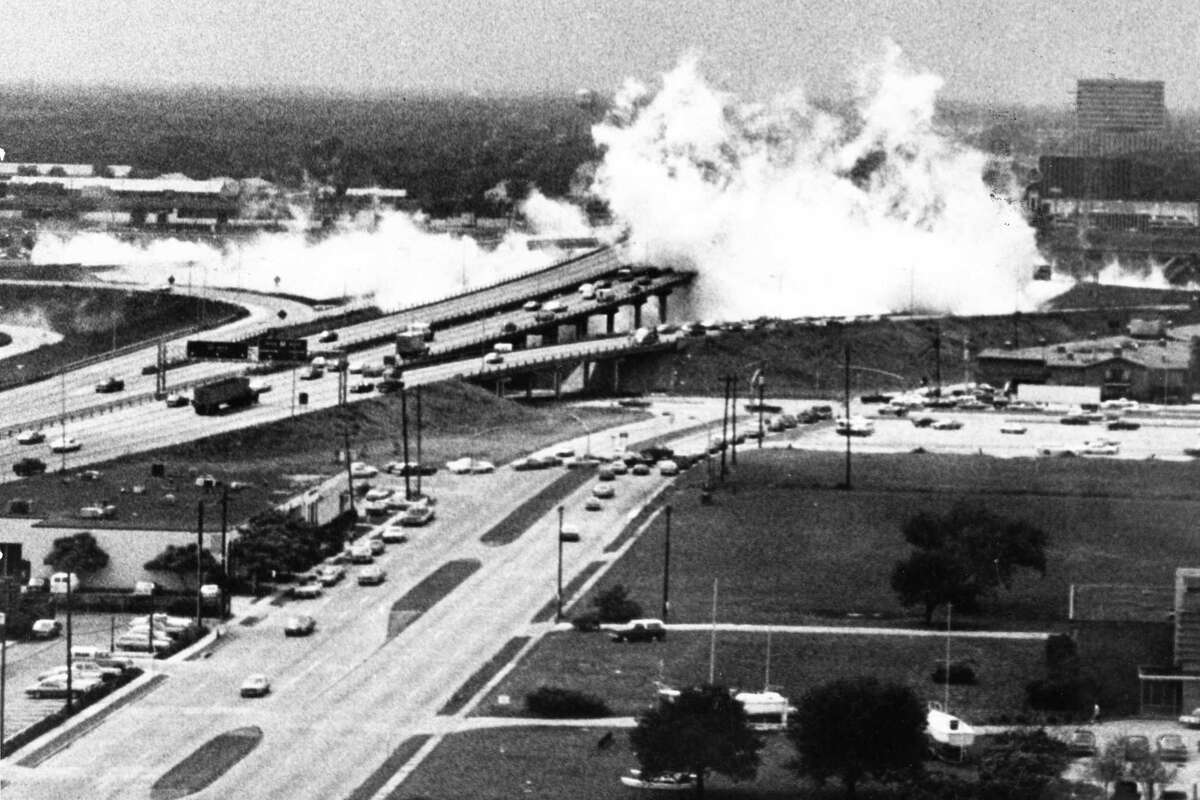 05/11/1976 - Clouds of deadly ammonia fumes spread over the West Loop 610 overpass at the Southwest Freeway after an ammonia tank truck crashed through a guardrail and exploded. This photo, looking south, was taken about a minute after the crash from the Transco Tower in the Galleria area by Carroll S. Grevemberg.