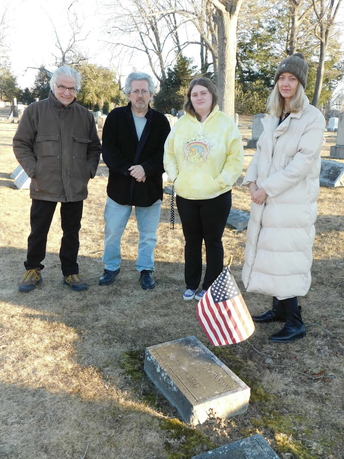 From left, Arts & Culture Commission members Bill Haygood, Edward Cannata, Rachel Kelly and Molly Hogan stand near the headstone of lyricist Howard E. Johnson, February's Person of the Decade for the 1920s, at Hillside Cemetery in Torrington. Missing are commission members Kristi Barto and Janet Iffland.