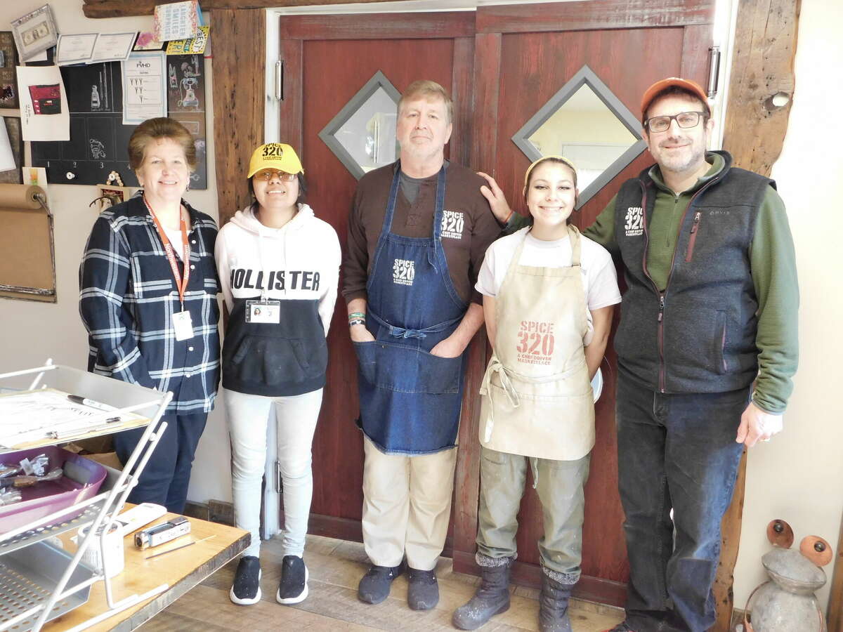 From left, Valerie Richard, supervisor for Highlander Transition Academy; April Bautista, a trainee at Spice320 under Richard's supervision; Alan Thayer, chef and co-owner; Chelsea Gillotte, kitchen worker; and Rick Marchesseault, renovator and co-owner. 