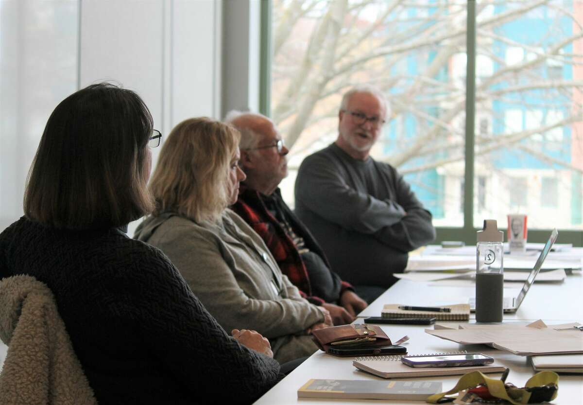 City of Manistee Housing Commission members Karen Goodman, Gini Pelton, James Smith and Steve Fosdick discuss on Feb. 21 during a housing commission meeting.