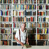 Larry McMurtry, the famed Texas novelist, screenwriter and bookseller, stands in his bookstore, Booked Up, in Archer City in 2012. ( Michael Paulsen / Houston Chronicle )