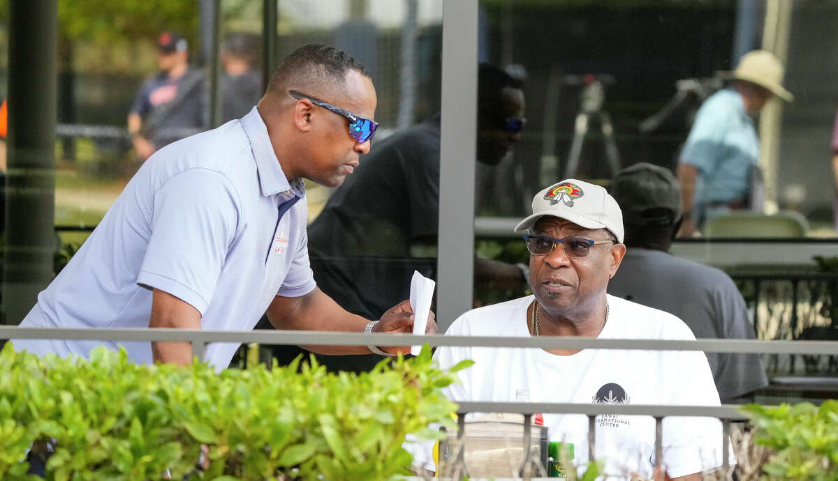 Houston Astros manager Dusty Baker Jr. talks with GM Dana Brown after workouts for pitchers and catchers at the Astros spring training complex at The Ballpark of the Palm Beaches on Friday, Feb. 17, 2023 in West Palm Beach, Florida.