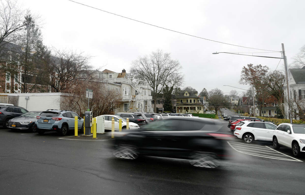 A driver searches for parking in the completely full Amogerone Lot in downtown Greenwich, Conn. Thursday, Feb. 23, 2023. A proposed change would double the cost of parking on Greenwich Avenue, bringing the price up to $2 per hour, or 50 cents for 15 minutes.