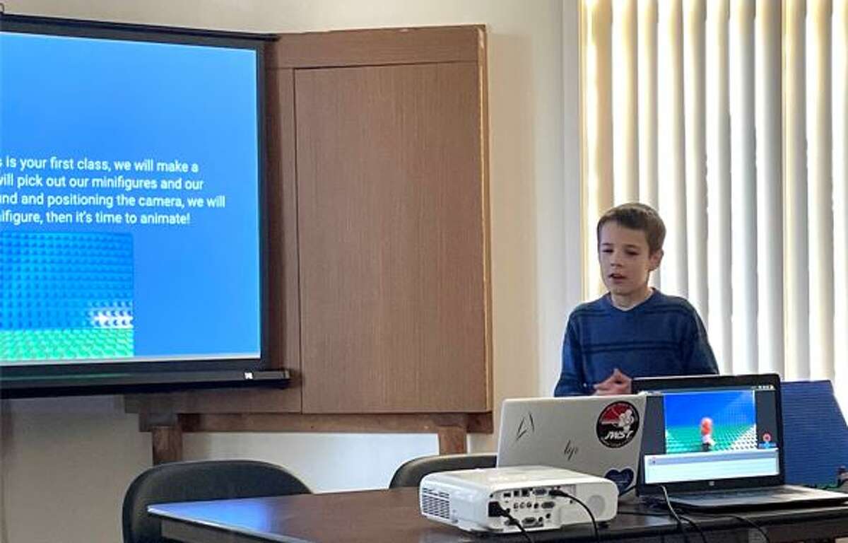 Ten-year-old Jude Bendorf provides the instruction at a meeting of the Stop Motion Club at the Carlinville Public Library. Enthusiastic youngsters in the club find ways to create eye-catching animation using stop motion techniques.     
