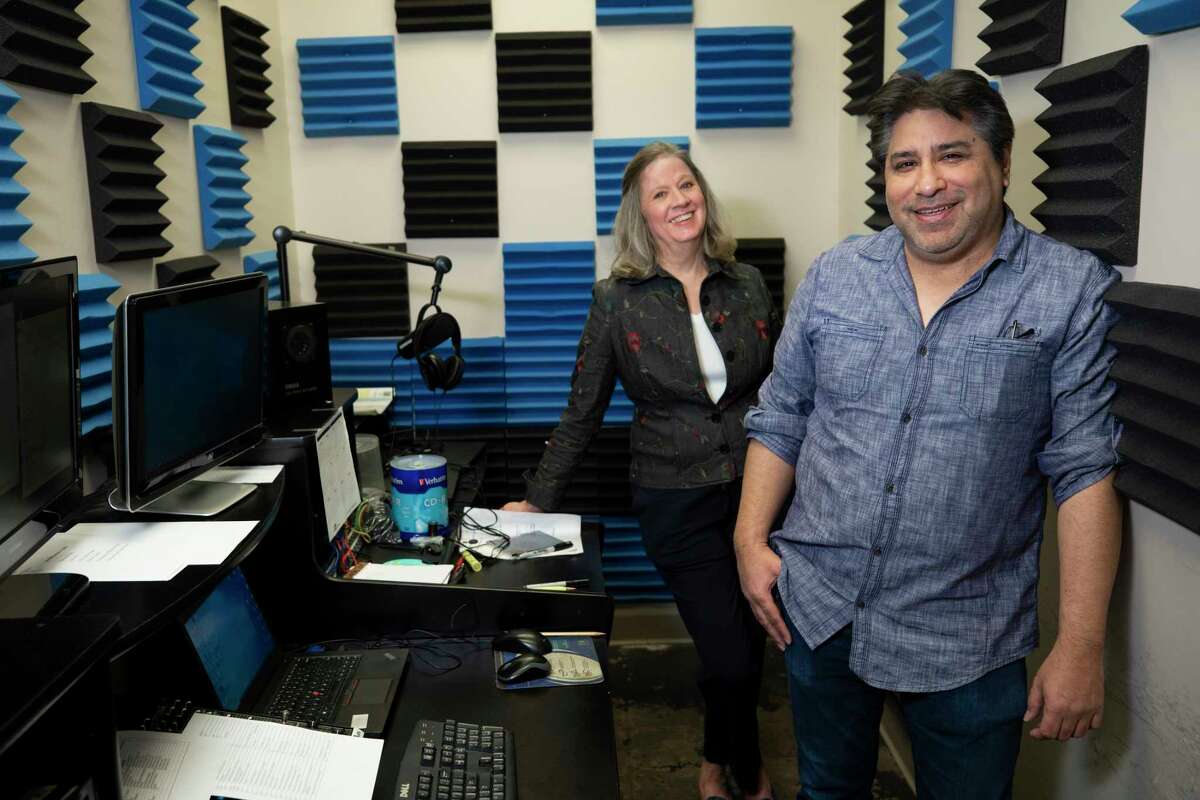 Kari Musgrove, executive director, left, and Jim Martinez, senior production/audio engineer, pose for a portrait at Sight Into Sound on Thursday, Feb. 23, 2023 in Houston. The organization started in 1967 as Taping for the Blind, a non-profit group that had trained volunteers read the newspaper each morning, with reel-to-reel tape recorders, it has ridden wave after wave of technological change. The coronavirus pandemic pushed into an all-digital format, with many of its listeners now using smart speakers to listen, and it has audience all over the world.