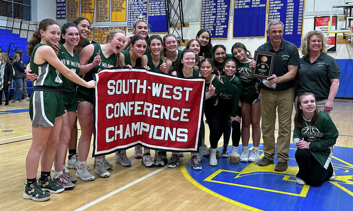 The New Milford girls basketball after defeating Immculate for the SWC girls basketball championship in Newtown on Thursday, Feb. 23, 2023.
