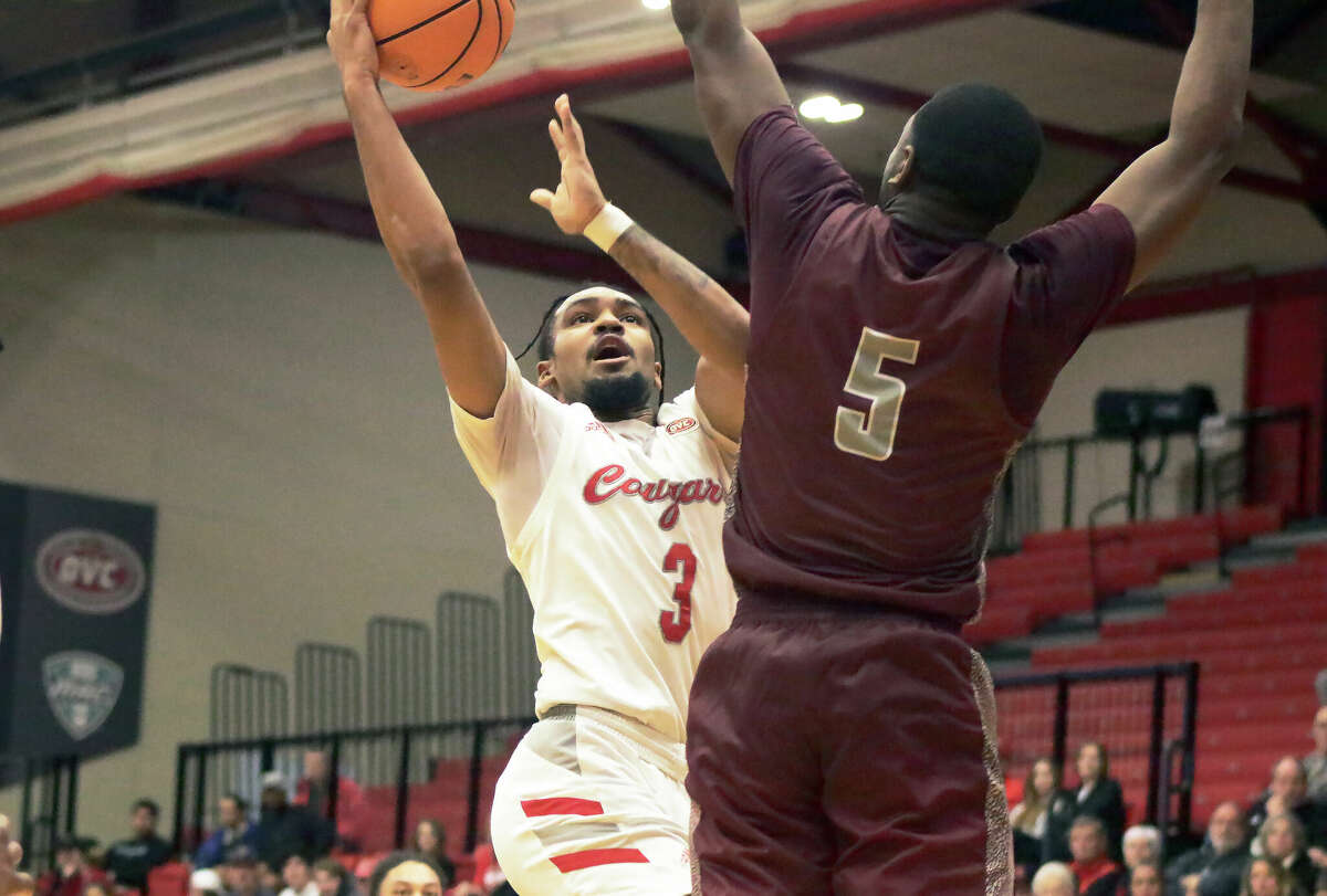 Ray'Sean Taylor scores against Little Rock on Thursday inside First Community Arena. Taylor scored 21 points in the Cougars' 79-74 Ohio Valley Conference loss.