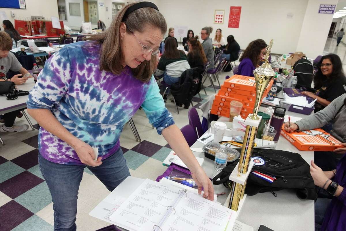Sabine Pass UIL academics science sponsor Hope Henderson showcases study materials. Photo taken Feb. 11, 2023. Photo by Olivia Malick/The Enterprise.
