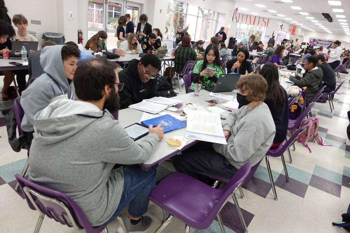 The Sabine Pass social studies team gets in one last study session before the competition at the Port Neches-Groves Invitational Meet. Photo taken Feb. 11, 2023. Photo by Olivia Malick/The Enterprise.