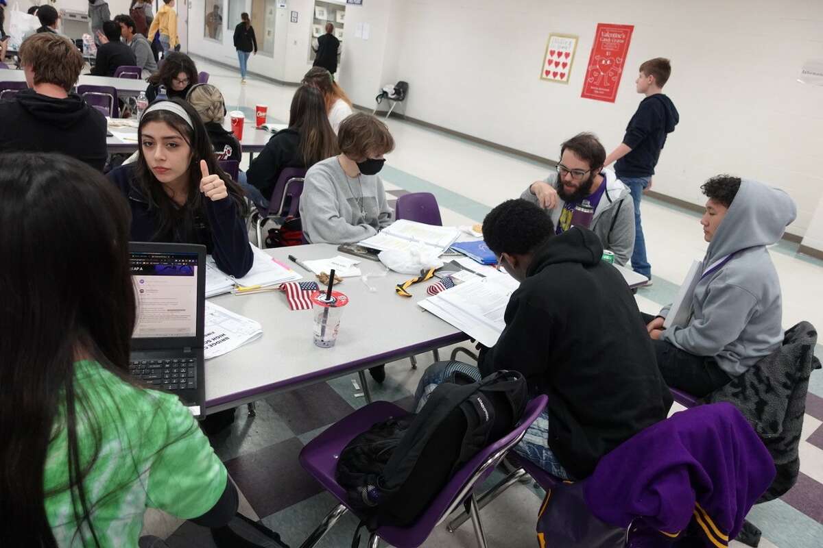 The Sabine Pass social studies team gets in one last study session before the competition at the Port Neches-Groves Invitational Meet. Photo taken Feb. 11, 2023. Photo by Olivia Malick/The Enterprise.