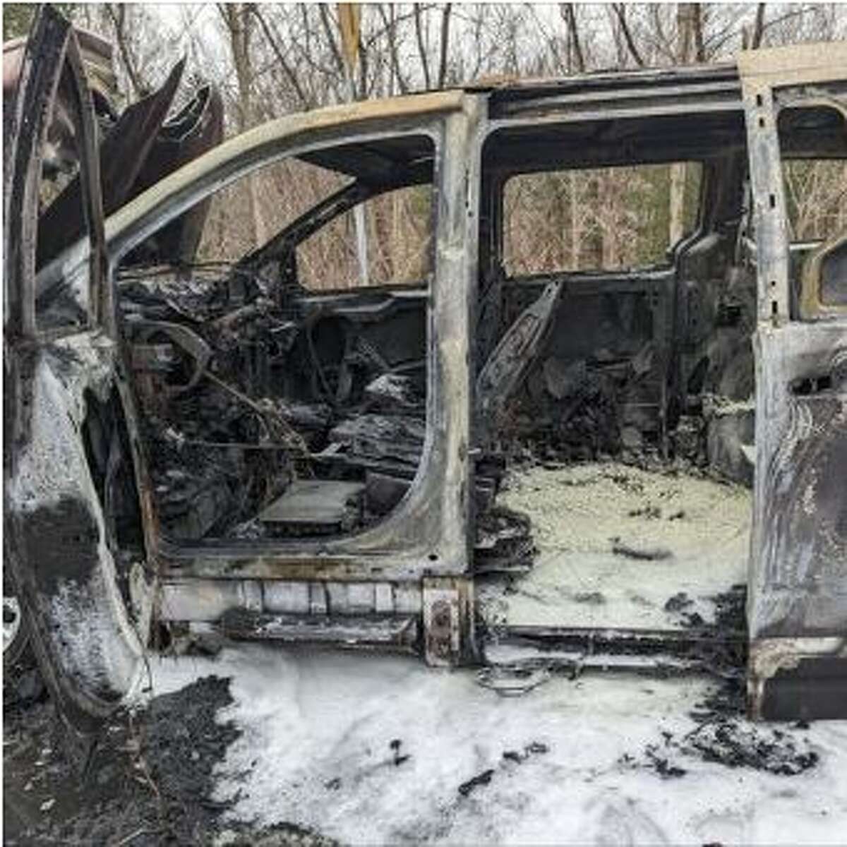 Heather Sica Leonard, a teacher at Illing Middle School, helped a disabled man from a burning van in Manchester Thursday, fire officials say. This is what the van looked like after it burned. 