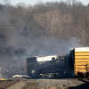 Smoke rises from a derailed cargo train in East Palestine, Ohio, on Feb. 4, 2023. (Dustin Franz/AFP/Getty Images/TNS)