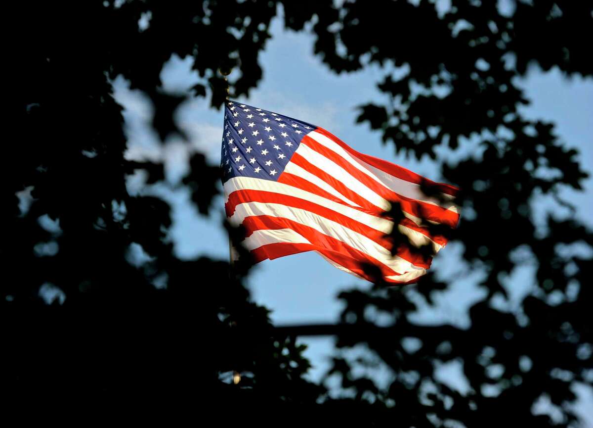 The American flag flies in Newtown.