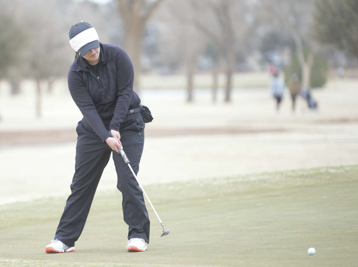 Andrews' Peighton Manning putts the ball on hole 9 during the Tall City Invitational, Feb. 24 at Ranchland Hills Golf Club. 