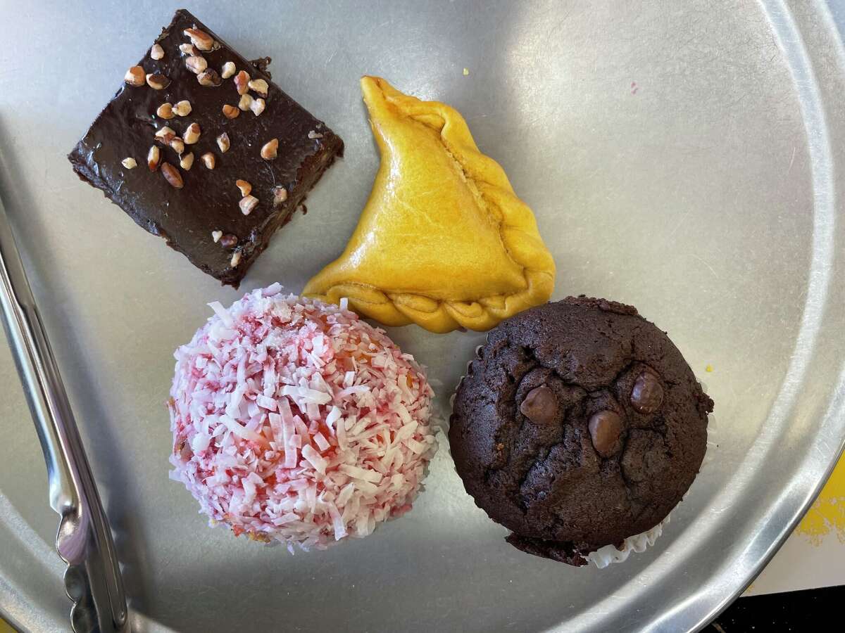 Hackberry Street lined with neighborhood bars, sweets and iconic eats