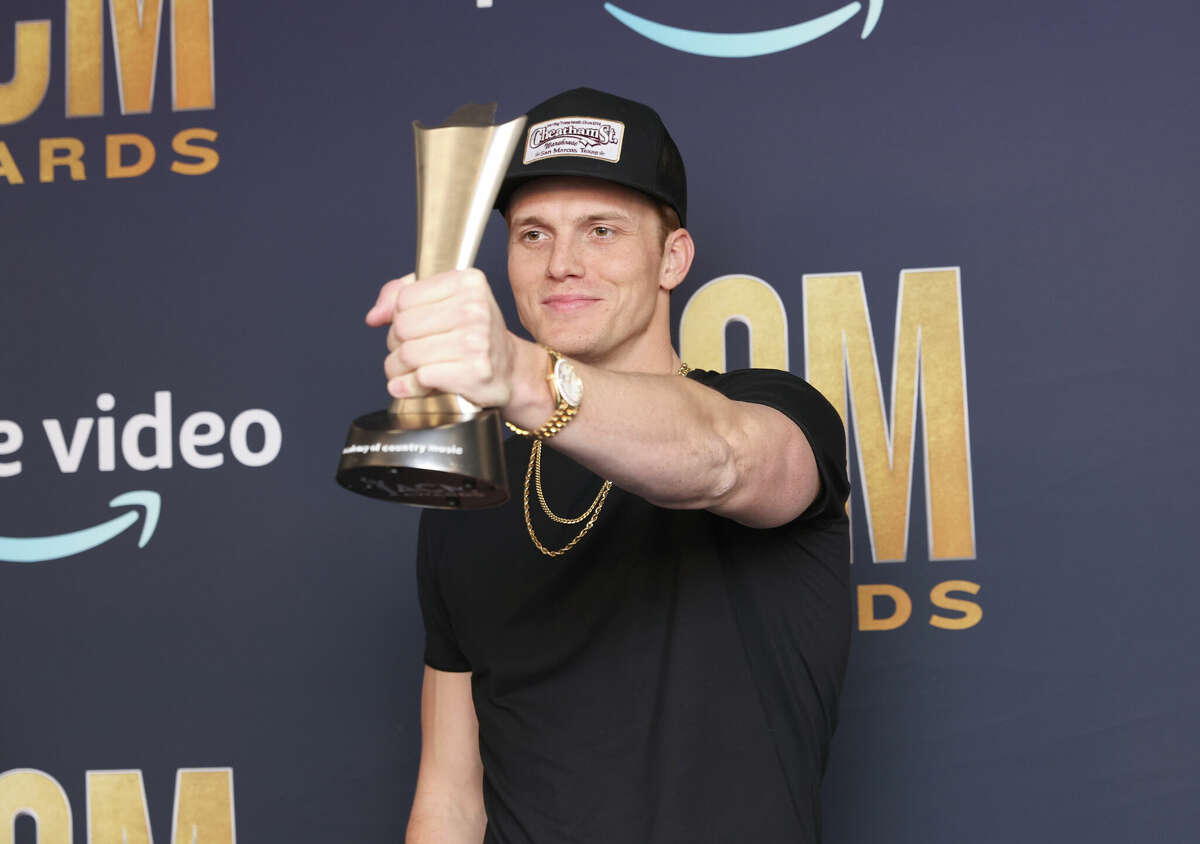 Parker McCollum, winner of New Male Artist of the Year, poses in the press room during the 57th Academy of Country Music Awards at Allegiant Stadium on March 07, 2022 in Las Vegas, Nevada. On Monday at lunch, Conroe residents will be able to pair their craving for crispy chicken fingers with their love for hometown boy Parker McCollum at Raising Cane’s at 2127 West Davis Street near Conroe High School.  