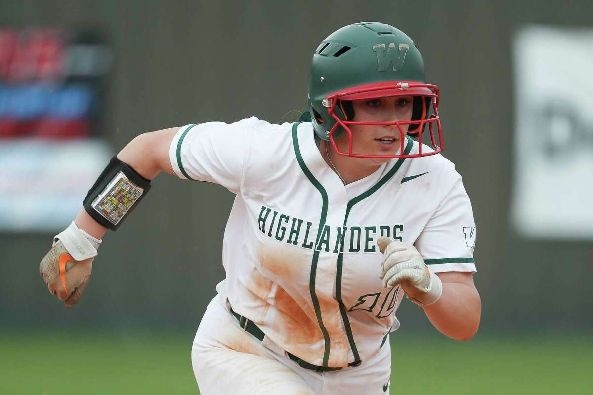 Gabby Leach #10 of The Woodlands steals third base during the third inning of a non-district high school softball game at The Woodlands High School, Friday, Feb. 24, 2023, in The Woodlands.