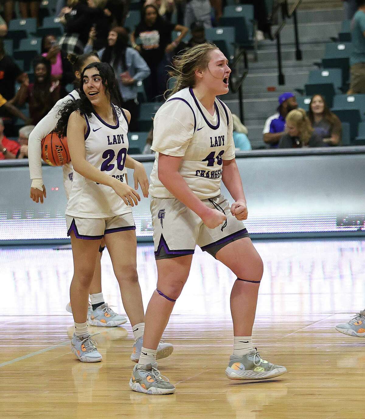 KATY, TX -FEBRUARY 24: Fulshear Chargers celebrate their win over Pflugerville Panthers during a Region III-5A semifinal basketball game at the Merrell Center February 24, 2023 in Katy,Texas.