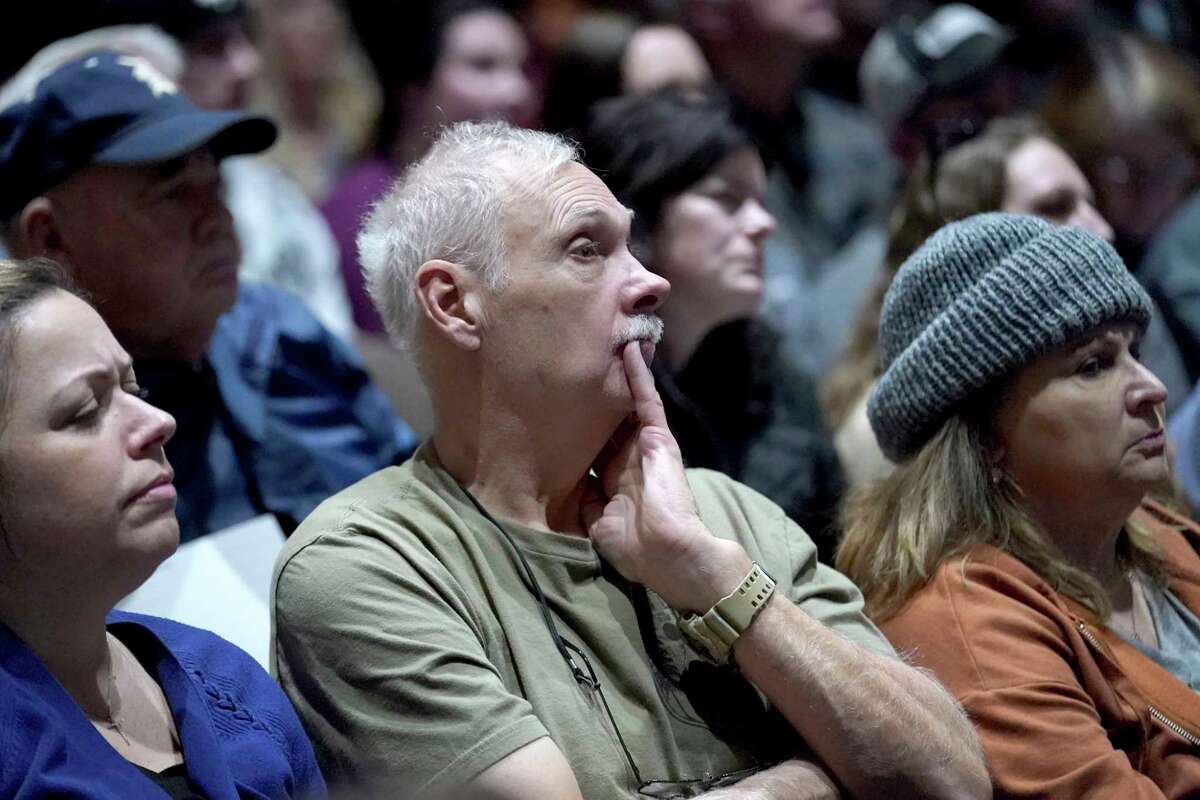 East Palestine residents listen to a town hall meeting at East Palestine High School concerning the Feb. 3 Norfolk Southern freight train derailment in East Palestine, Ohio, Friday, Feb. 24, 2023.