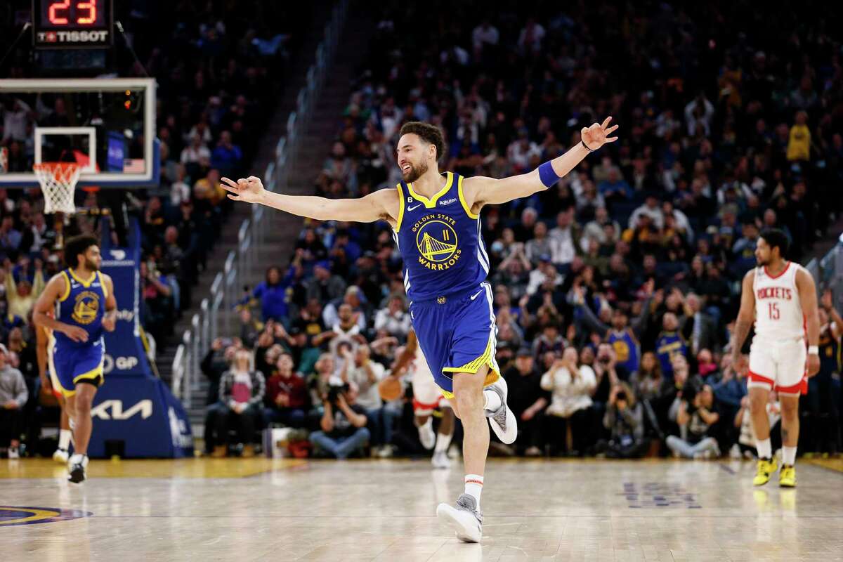 Golden State Warriors guard Klay Thompson celebrates after scoring a 3-point shot against the Houston Rockets in the fourth quarter at Chase Center on Friday. The Warriors won 116-101.