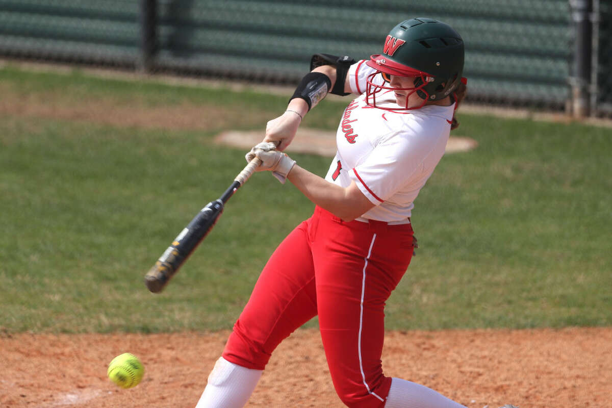Alannah Leach #1 of The Woodlands hits an RBI single during the first inning of a non-district high school softball game at The Woodlands High School, Saturday, Feb. 25, 2023, in The Woodlands.