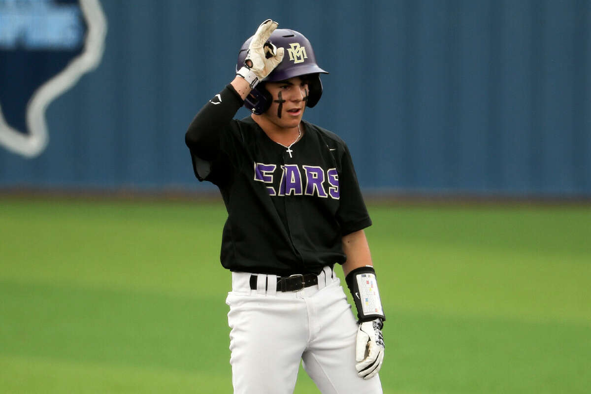 Montgomery’s Chase Hiatt (14) reacts after hitting a double during the fifth inning of a non-district high school baseball game at Kingwood High School, Saturday, Feb. 25, 2023, in Kingwood.