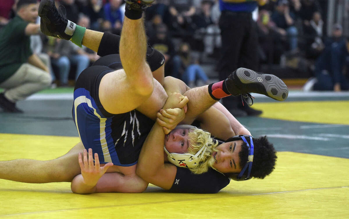 Avon wrestling claims Class M crown; Killingly wins Class S title