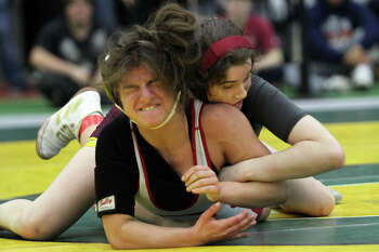 Avon wrestling claims Class M crown; Killingly wins Class S title